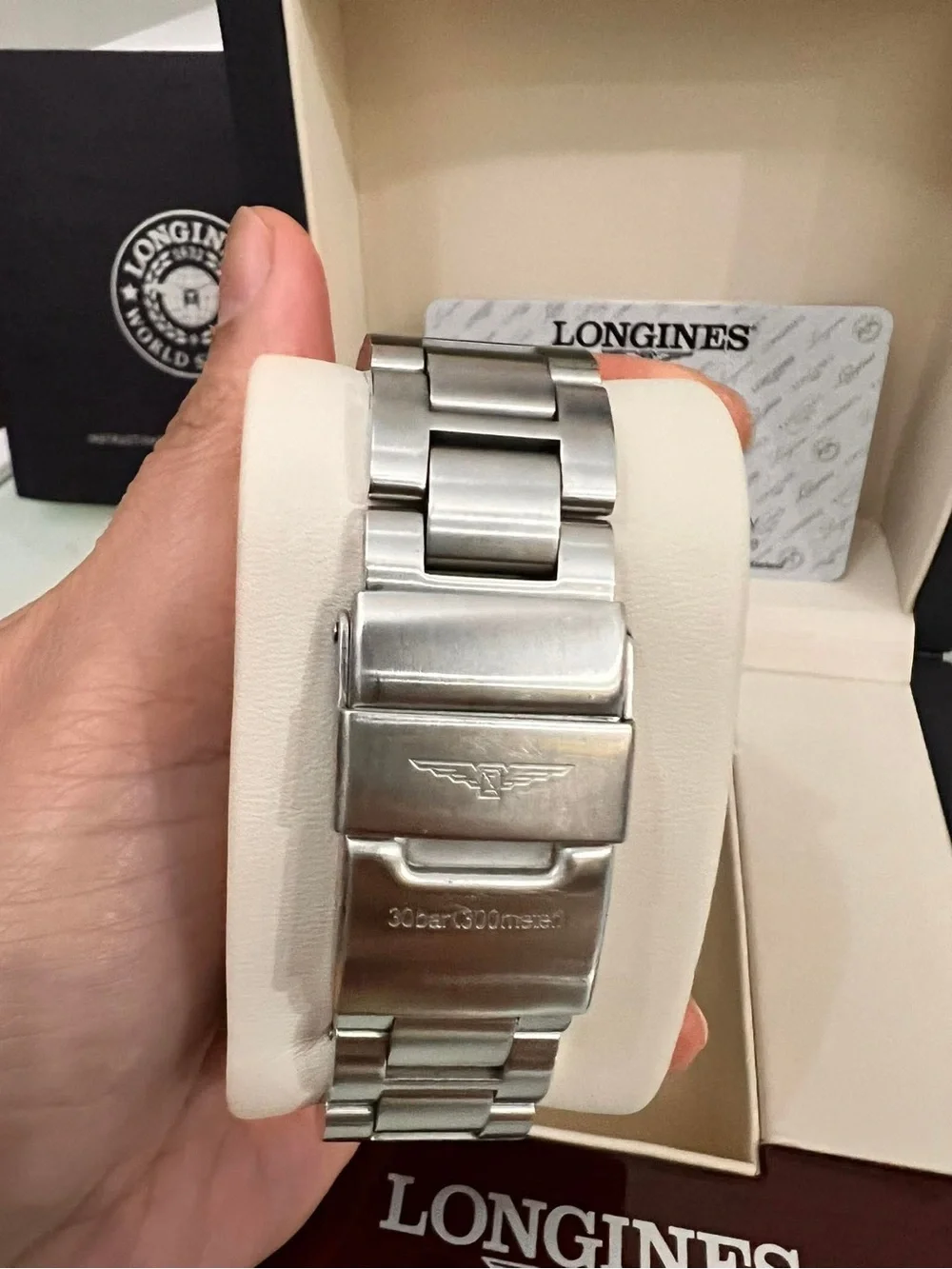 Longines Silver Steel Chronograph Watch with White Dial and Black Bezel